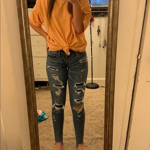 American Eagle medium wash, ripped, skinny jeans